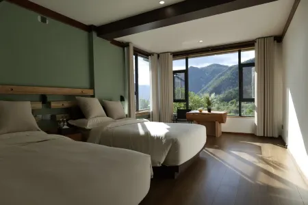 Shangri-La Haba Summit Inn Отели рядом с достопримечательностью «Habacun»