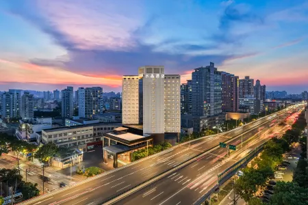 Orange Crystal Hotel Отели рядом с достопримечательностью «Fudan University Jinglaitang»