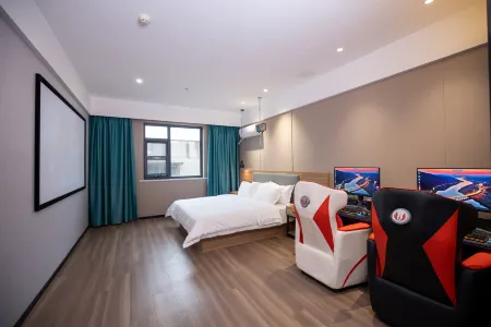 Taku E-sports Hotel (Gongyi Xinhua Road) Отели рядом с достопримечательностью «Kang Bai Wan Zhuang Yuan»