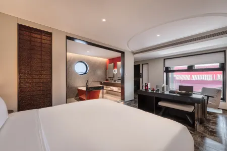 Hefeng Jingli Hotel (Houhai Gongwangfu Store) Отели рядом с достопримечательностью «Sinopec Management Institute Branch»