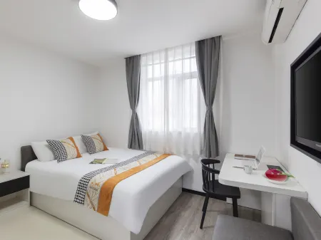 CJIA Serviced Apartment (Shanghai Zhongtan Road Subway Station) Отели рядом с достопримечательностью «Shanghai University of Engineering Science (Xincun Road)»