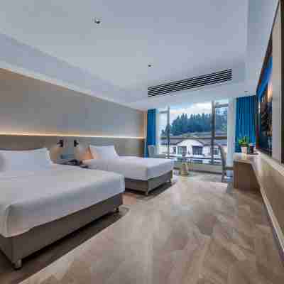 万信ホテル(自貢富順沿灘高速鉄道駅) Rooms