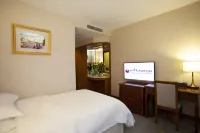 Beijing Soluxe Heyi Hotel Tarim Отели рядом с достопримечательностью «Пекинский информационно-технический университет Цинхэ Сяолайм Кампании-Юж»