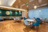 Xinyue Yasu Hotel (North Square Store of Shiyan Railway Station) - فطور