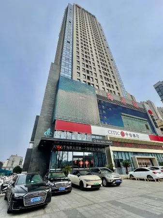 Qilinwan Hotel (Xiangyang Changhong Road Minfa Plaza) Отели рядом с достопримечательностью «Fengchu Bridge»