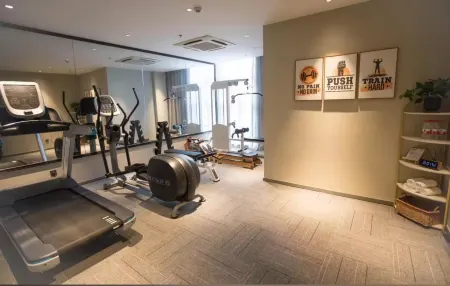 Jingfang E-sports Hotel (Rudong Xiruncheng Store) Отели в г. Жудун