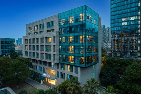 City Garden Hotel (Suzhou Kunshan Huaqiao Lvdi Avenue) Отели рядом с достопримечательностью «TIANFU WETLANDS»