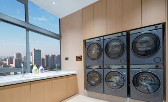 Manbu Shiguang Hotel (East Station Wuyi Plaza)