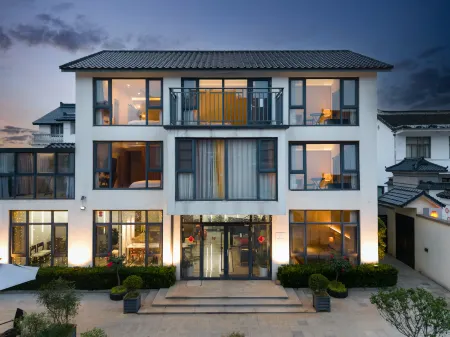 Suzhou Village inn Отели рядом с достопримечательностью «Shanghai Customs College Suzhou Branch»