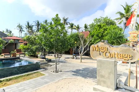 Mega Cottages Отели рядом с достопримечательностью «Twin Island Dive»