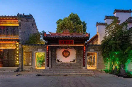 Jiuhe Chuxin Inn Отели рядом с достопримечательностью «Taierzhuang Ancient Town»