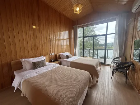 Kong West Island Guesthouse (Luxi West Sea Scenic Area Branch) Отели рядом с достопримечательностью «Shenwu Mountain»