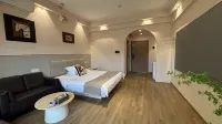 Shangyu Audio-Video High-Rise City View Suite Apartment (Tianmen Mountain Cableway Branch) - โรงแรมราคาถูก
