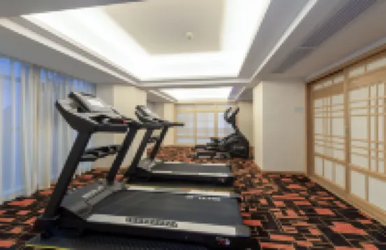 Huzhou Wells Hotel (Zhili Wuyue Plaza China Children's Wear City)