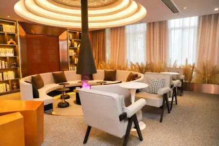 Zijin Tongye Hotel Отели в г. Шанхан