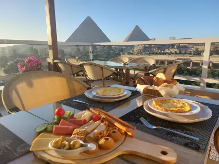 Doudou Pyramids View Hotel Отели в г. Kafr Nassar