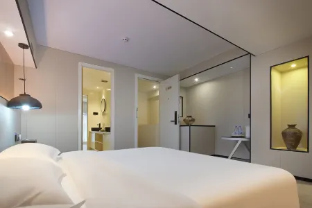 Puyueju Hotel Отели в г. Сямэнь