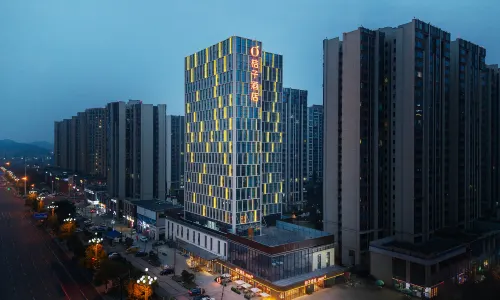 Orange Hotel (Leshan High-speed Railway Station Shihao Plaza)