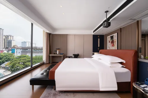 Soluxe Hotel (Xishuangbanna Jinghong Water Splashing Square Riverside Night Market Branch) - Pet friendly