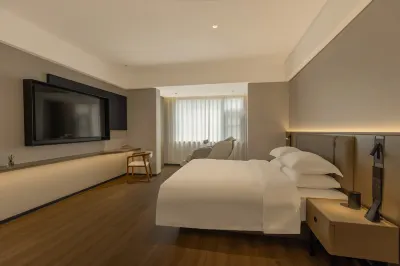 China/Henan/Nanyang/Wancheng District /X014 30 meters east of Longteng Community Deli Stationery Hotels near Vocational Technical College