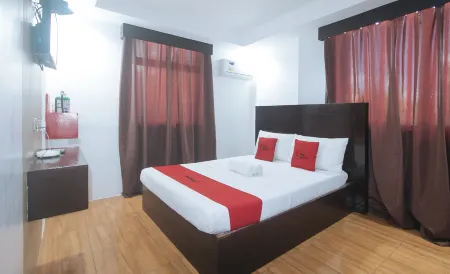 RedDoorz @ Junquera Extension Cebu Отели рядом с достопримечательностью «Университет Висейас, Экспандед Тершиари Эдьюкейшен Экиваленси энд Аккредитейшен Програм»