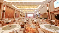 Huazhou Huaxun Wyndham Hotel - พร้อมอาหารเช้า