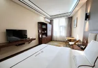 Shizong Tongyuan Hotel - موقف سيارات