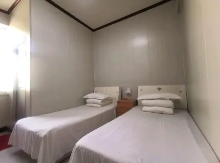 Xiong County Huiyou Hotel Отели рядом с достопримечательностью «Songliao Bianguan Gu Tunnel»