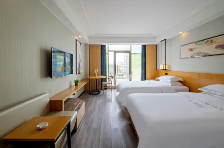 Qingmu Platinum Hotel (Guanghan Bailun Square Tianjie Branch) Отели в г. Гуанхан