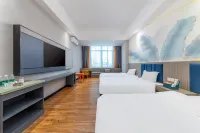Xiangqing Qi'an Smart Hotel (Tunchang Central Commercial Plaza)