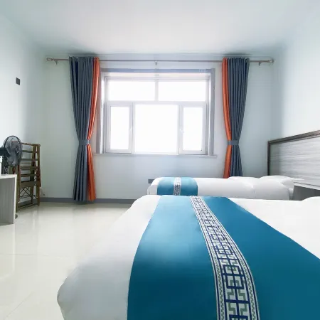 Wuchuan Guoji Homestay