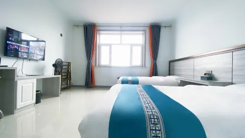 Wuchuan Guoji Homestay - Parkplatz