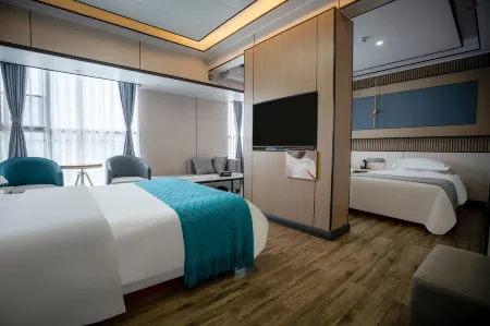 Qinghua Business Travel Hotel (Kunming South High-speed Railway Station University Town) Отели рядом с достопримечательностью «Kunming University of Science and Technology Chenggong Campus Library»