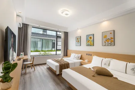 Chun Shu mu yun linhai boutique minsu (Dali caicun wharf branch)