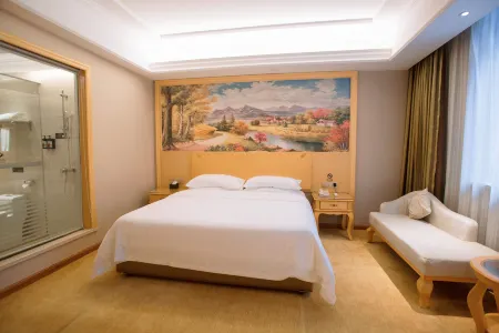 Yixuan Hotel (Hechi Yizhou Sankeshu Market Branch) Отели рядом с достопримечательностью «Hechi University»