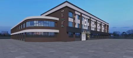 World Smart Hotel (Dexian Street Grad Road) Отели рядом с достопримечательностью «Dezhou Botanical Garden»