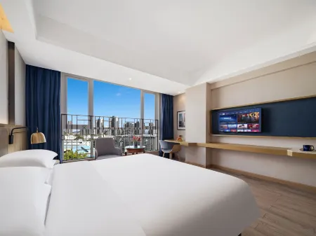 Kyriad  Marvelous Hotel Shenzhen International Low Carbon City Subway Station Отели рядом с достопримечательностью «Caiyun Gymnasium»