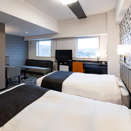 APA Hotel and Resort (Sapporo) Отели рядом с достопримечательностью «Станция метро Sumikawa»