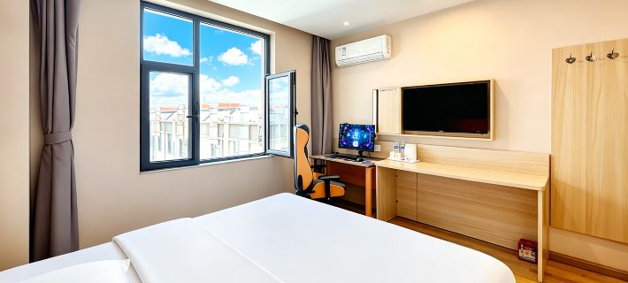 Yaxin E-Sports Hotel (Lüliang Xiaoyi Wanda Plaza City Hall) Hotéis em Xiaoyi