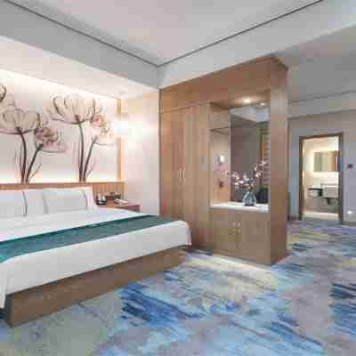 雲上四季尚品酒店（瑞麗多寶之城店） Rooms