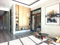 智美·輕居影音民宿（駐馬店高鐵西站凱旋廣場店）