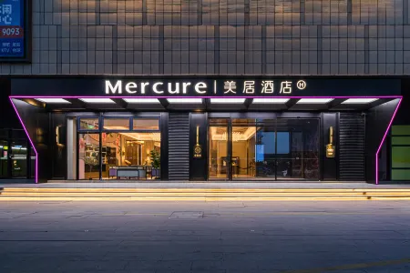 Mercure Wuxi East Railway Station Отели в г. Уси