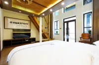 知易堂·卦裡閒庭·庭院休閒度假民宿（特克斯八卦城店） - 酒吧