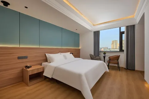Elong Wanguo Hotel (Zhumadian Pingyu County Jiefang Road Central Hospital Branch) - فطور