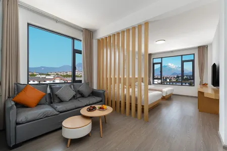 Xinhe Xiaoyuan Homestay (Lijiang High speed Railway Station) Отели рядом с достопримечательностью «Wenfeng Temple»