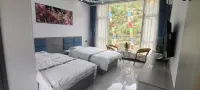 Eman Star River Homestay (Guan'e Grand Scenic Area Branch) - con vista montagne