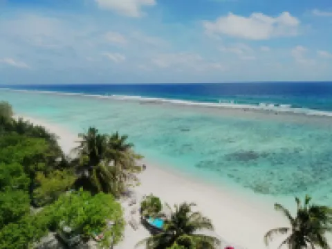 Aina Residency Beachfront Hotel