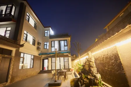 Shidian Jiu Yi Courtyard Hot Springs Chinese Inn