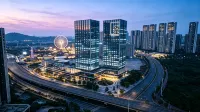 Fangli International Apartment (Shunde Overseas Chinese City Happy Coast Branch) - Condos