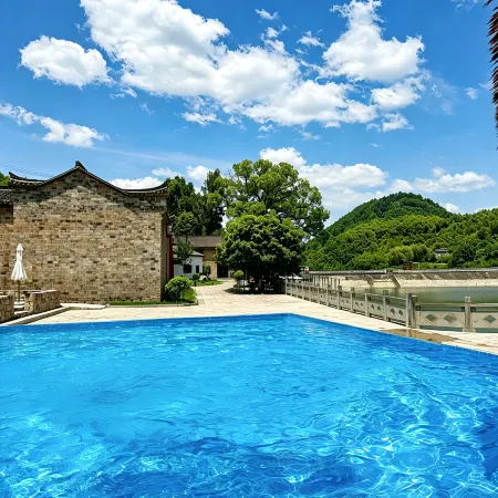 Jinyu Flower Hall Resort Homestay Отели рядом с достопримечательностью «Eshanxiang Cultural Center»